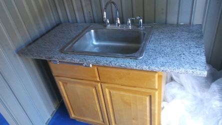 Stone Countertop with sink and cabinet