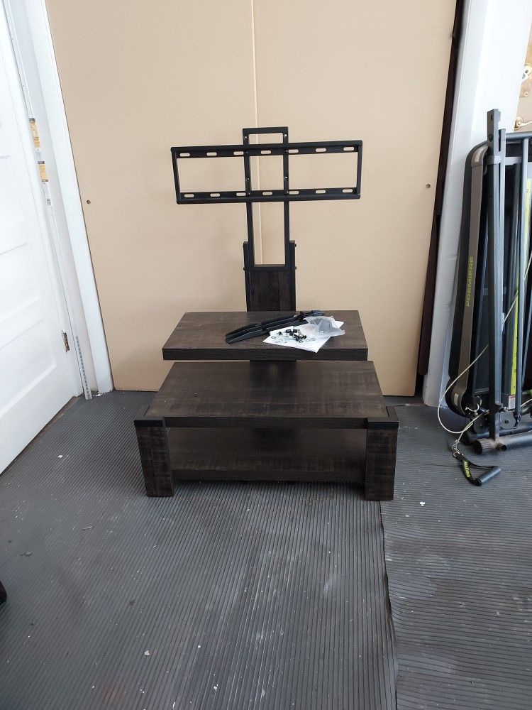Brand new entertainment and big screen TV holder. Never been used, all of the hardware included