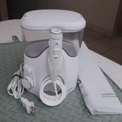 New 'Waterpik Water Flosser". 
