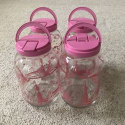 Very pretty big glass jar to use for any dry grocery $2:50Ea