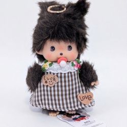 Viral “Punch” monkey  Monchhichi doll wearing a dress