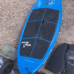 Surfboard 7 feet long 28 inches wide With Ankle Wand comes with the lifevest for adults