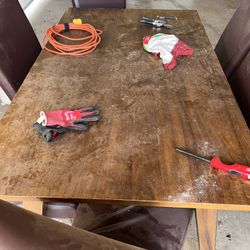 Wooden & leather dining room set purchased from Ashely’s furniture home store seven pieces