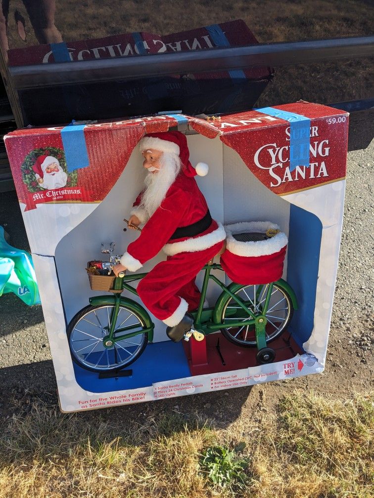 Cycling Santa. He really pedals and sings songs.