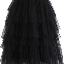 Long black three-step tulle skirt.