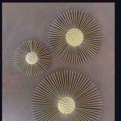 One New Gold Metal Wall Sculptures