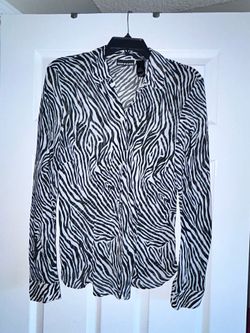 Vintage DKNY Jeans zebra print button-up blouse from the early 2000s. Lightweight woven fabric with a classic collared neckline and long sleeves. Grea