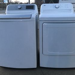 NEW WASHER AND DRYER