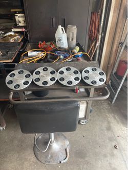 4 Chevy Center hubcaps