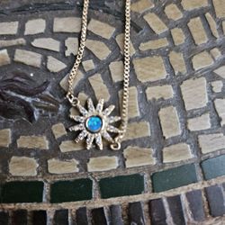 Gold Tone Sunburst bracelet.