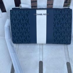 Michael Kors Large Size Wallet NWT Smartphone wallet • Logo-print canvas • 69% coated canvas/17% polyester/13% cotton/1% polyurethane • Trim: 100% lea