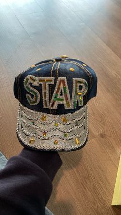 Jean and rhinestone hat that says star strep back