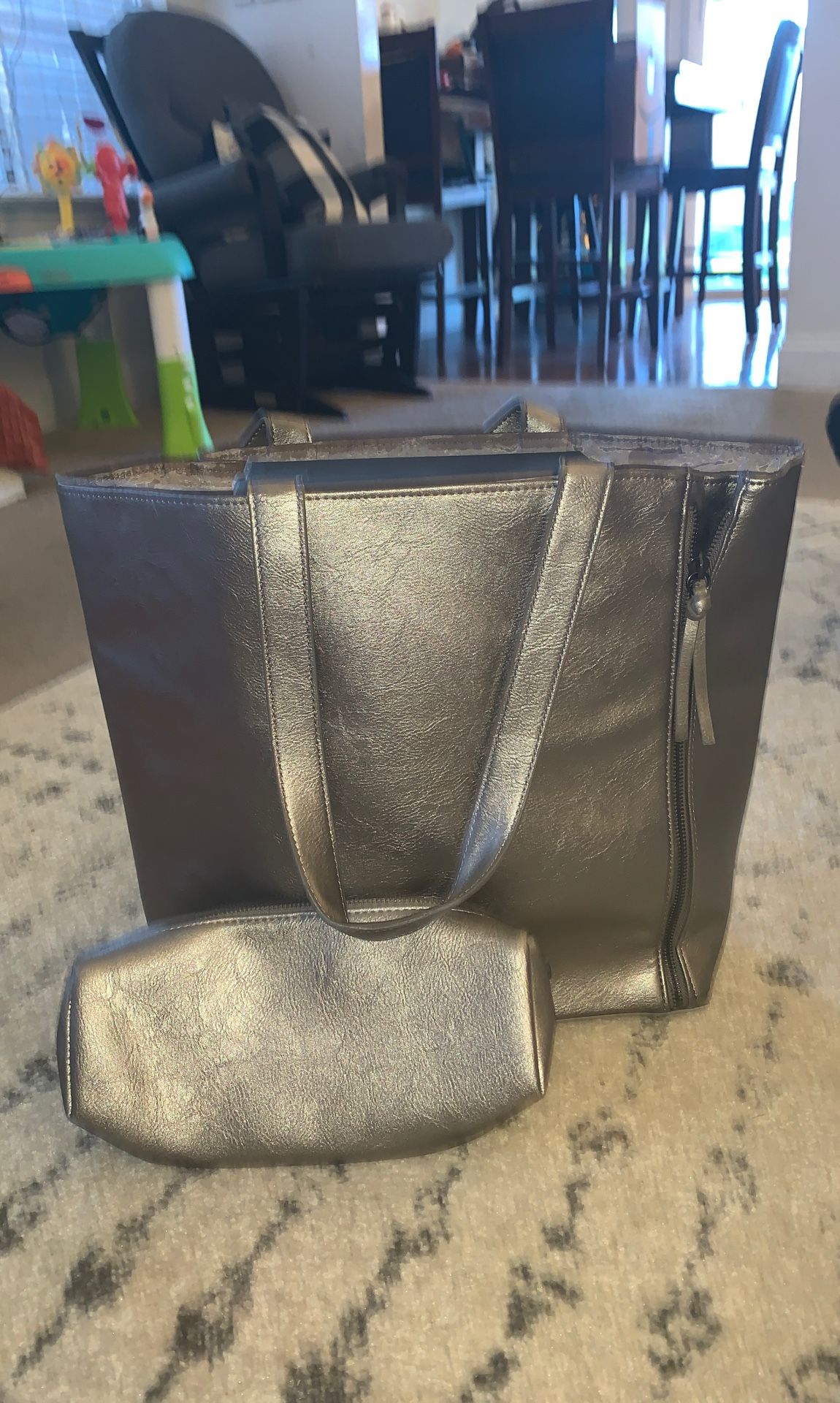 Silver purse and makeup bag