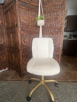 White and gold swivel chair