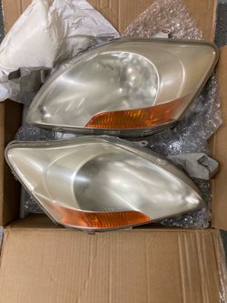 Original headlights Toyota Yaris 2007-2011 Sedan, Made in Japan.