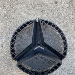 C300 Emblem Housing
