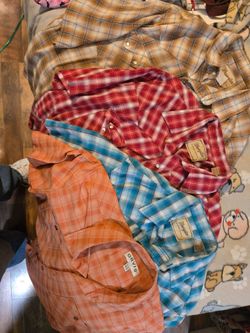 Shirts + a jacket + 2 vests