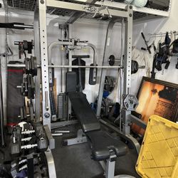 Smith Machine With Weight Plates Attachments And Bench
