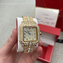 Gold Cartier bust down watch