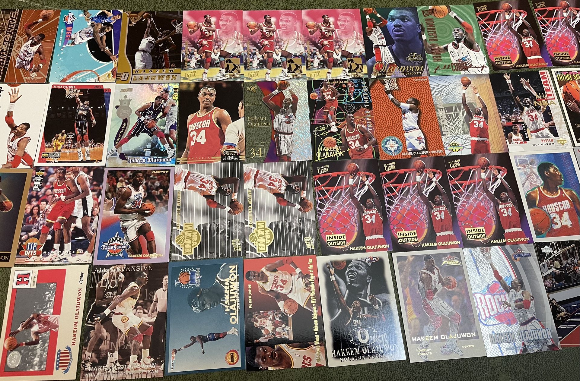 Lot of 39 NBA Hall of Famer Hakeem Olajuwon Basketball Cards