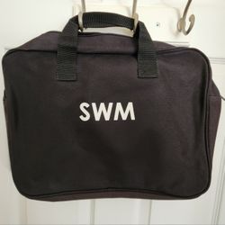 Duffle Tote Messenger Bag in all Black with 2 Handles and
one zipper. New,never used conditions. 
Measures about 16" inches across x 13" inches tall. 