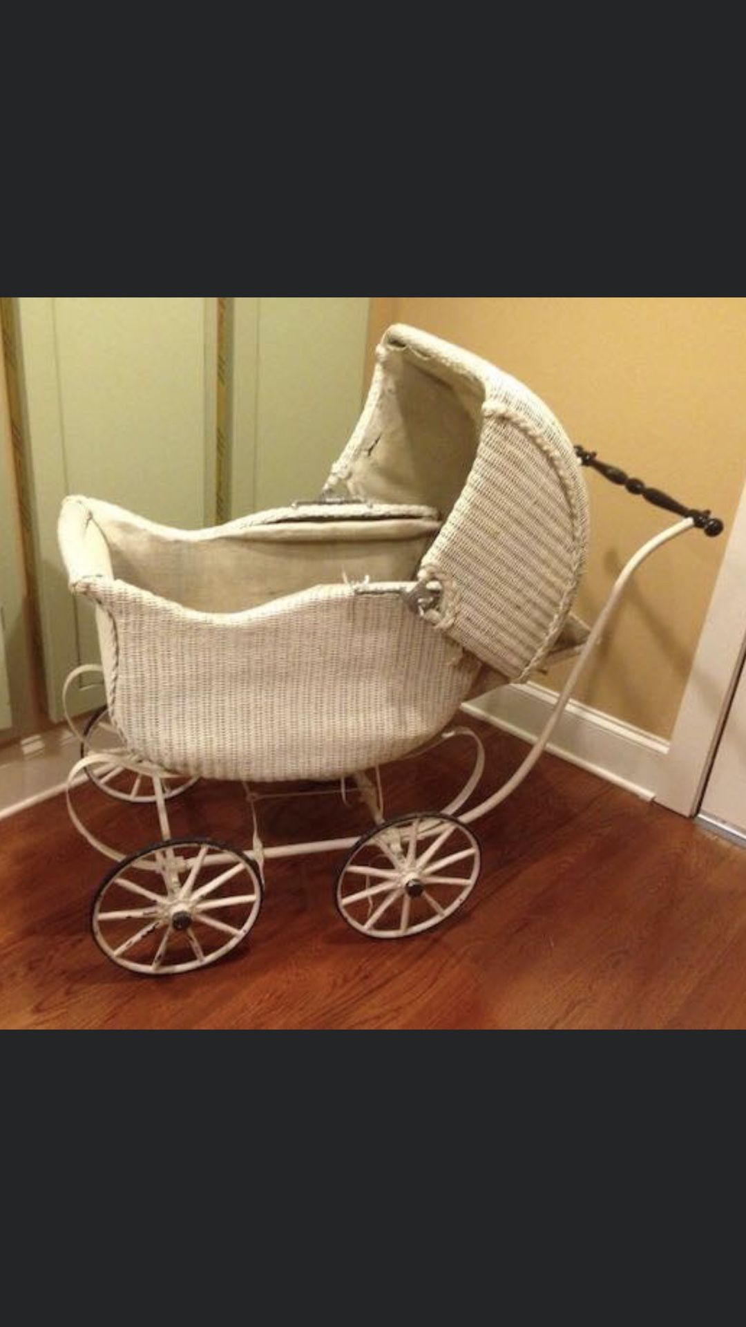 Antique wicker stroller, great for displaying dolls or blankets,etc