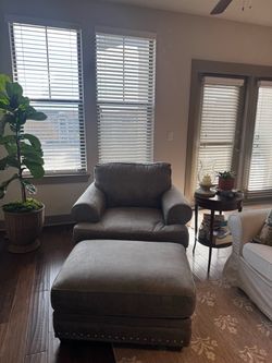 Gray Upholstered Armchair with Ottoman