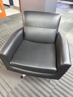 Swivel faux leather chair