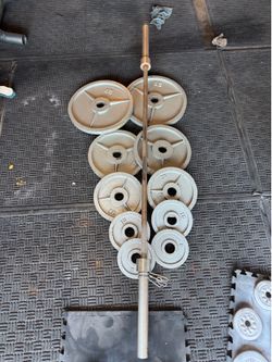 Olympic weights 7ft 45lbs bar plus 240lbs of Olympic weights