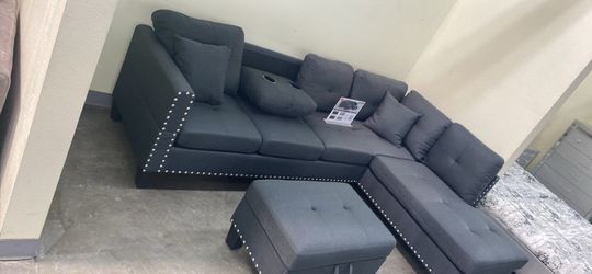 Sectional sofa new in box/ ottoman wit storage
