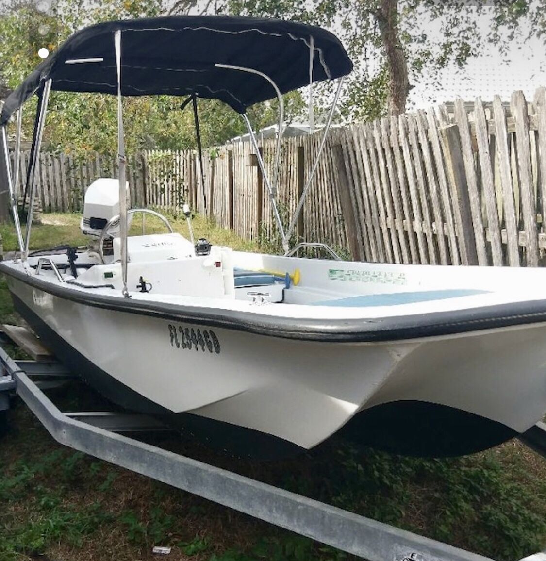 1987 McKee Craft CC Fisher 14 Foot Fiberglass Boat, 50 hp Johnson Motor, and Trailer