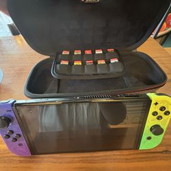 Nintendo switch + Games + Carrier Holder 