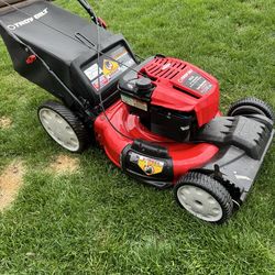 Troy Bilt Self Propelled Mower 190cc Engine w/ 21” Cutting Width. New Front Drive Wheels.Must Pickup