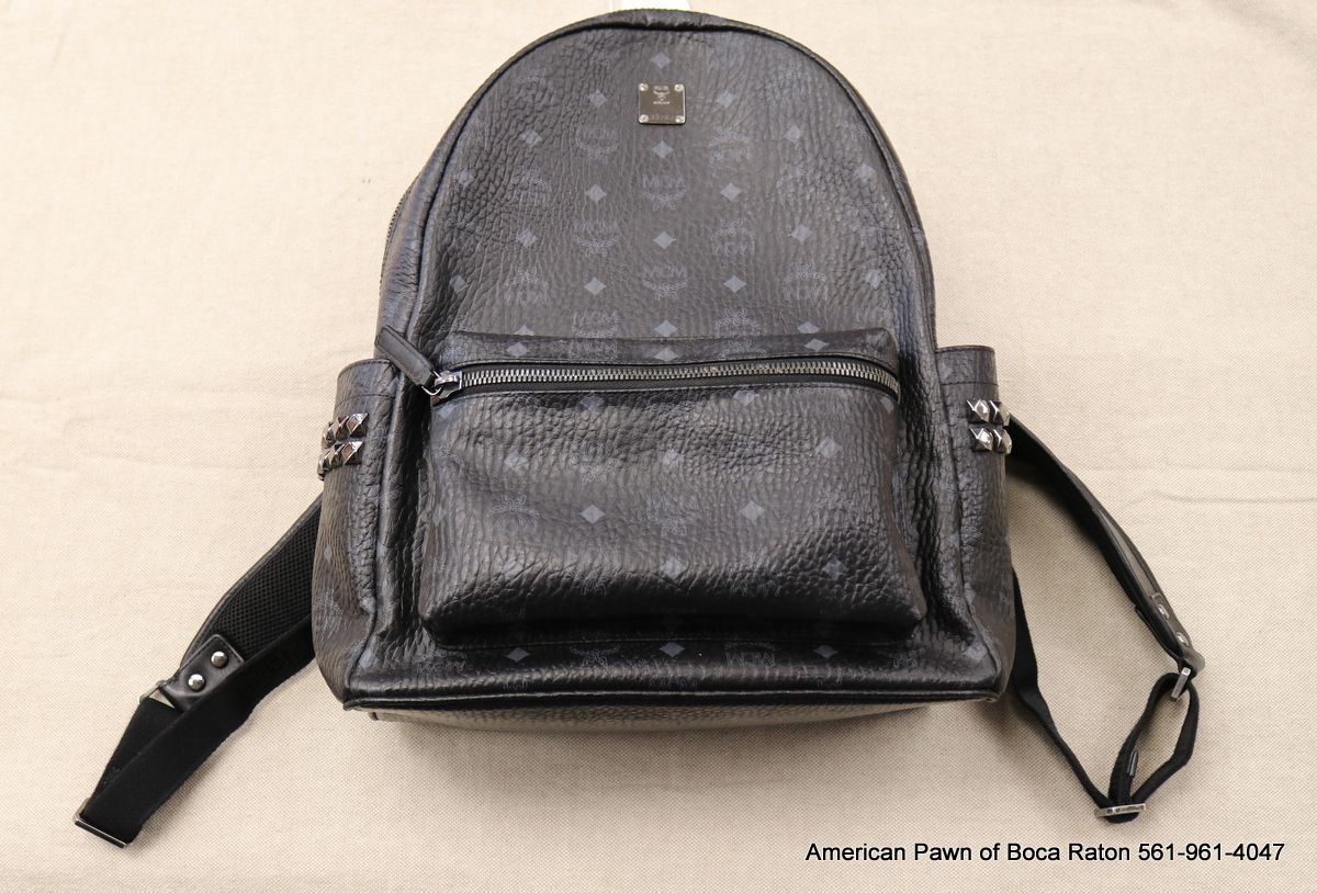 MCM backpack Model number: MMK6SVE38BK001 Black / gray / pre owned /