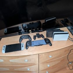 Nintendo Switch OLED Bundle With Two Games.