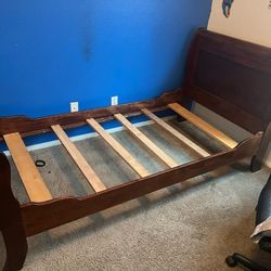 Twin sized wooden bed frame
