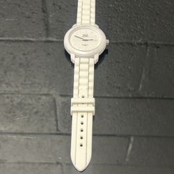 This watch is a Q&Q Quartz analog watch, a brand which is a subsidiary of Citizen Watch Corporation