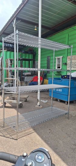 1 stationary Uline Brand commercial storage rack