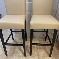 Two Crate And barrel Leather Bar Stools