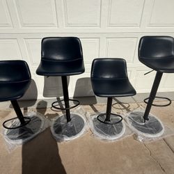 Brand new adjustable navy Blue bar stools only $85 Each