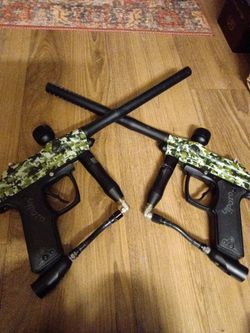 Azodin Kaos Paintball Marker, featuring a digital camouflage finish. And no the cat is not for sale I don't know how that ended up in there. Lol