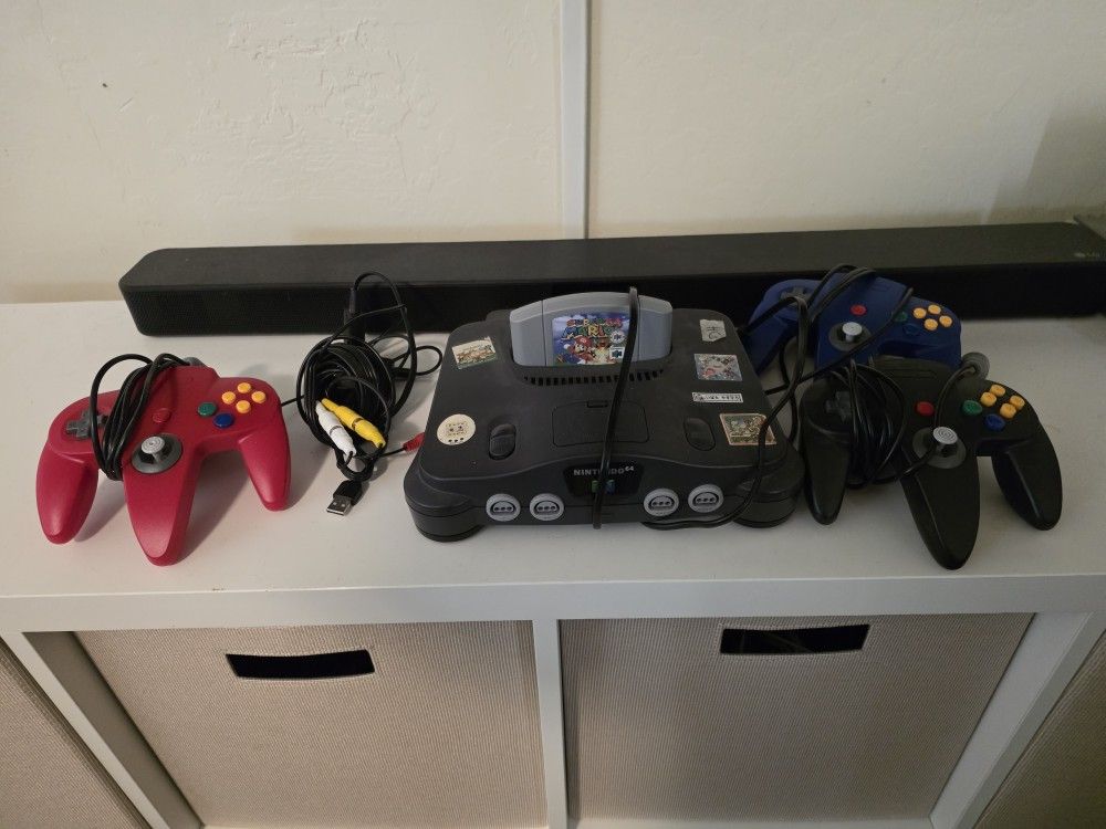 N64 Game And Three Controllers