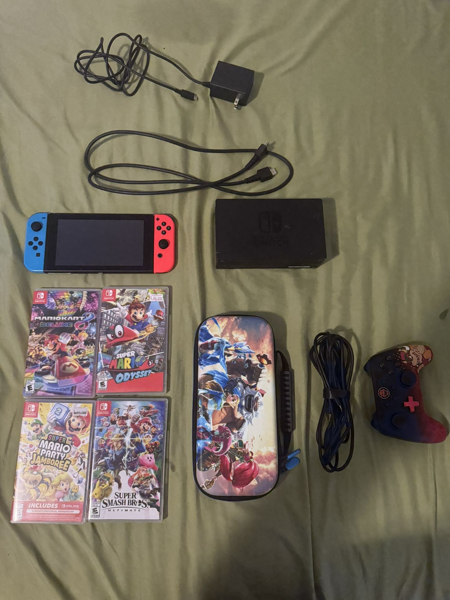 Nintendo Switch V2 W/128GB SD card and 4 Games