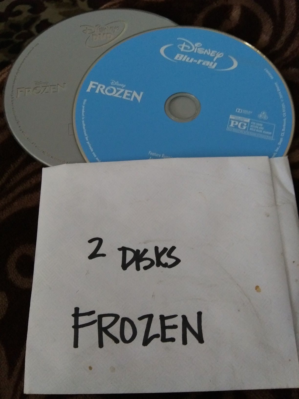 FROZEN 2 DISKS MOVIE PERFECT FOR YOUNG KIDS.