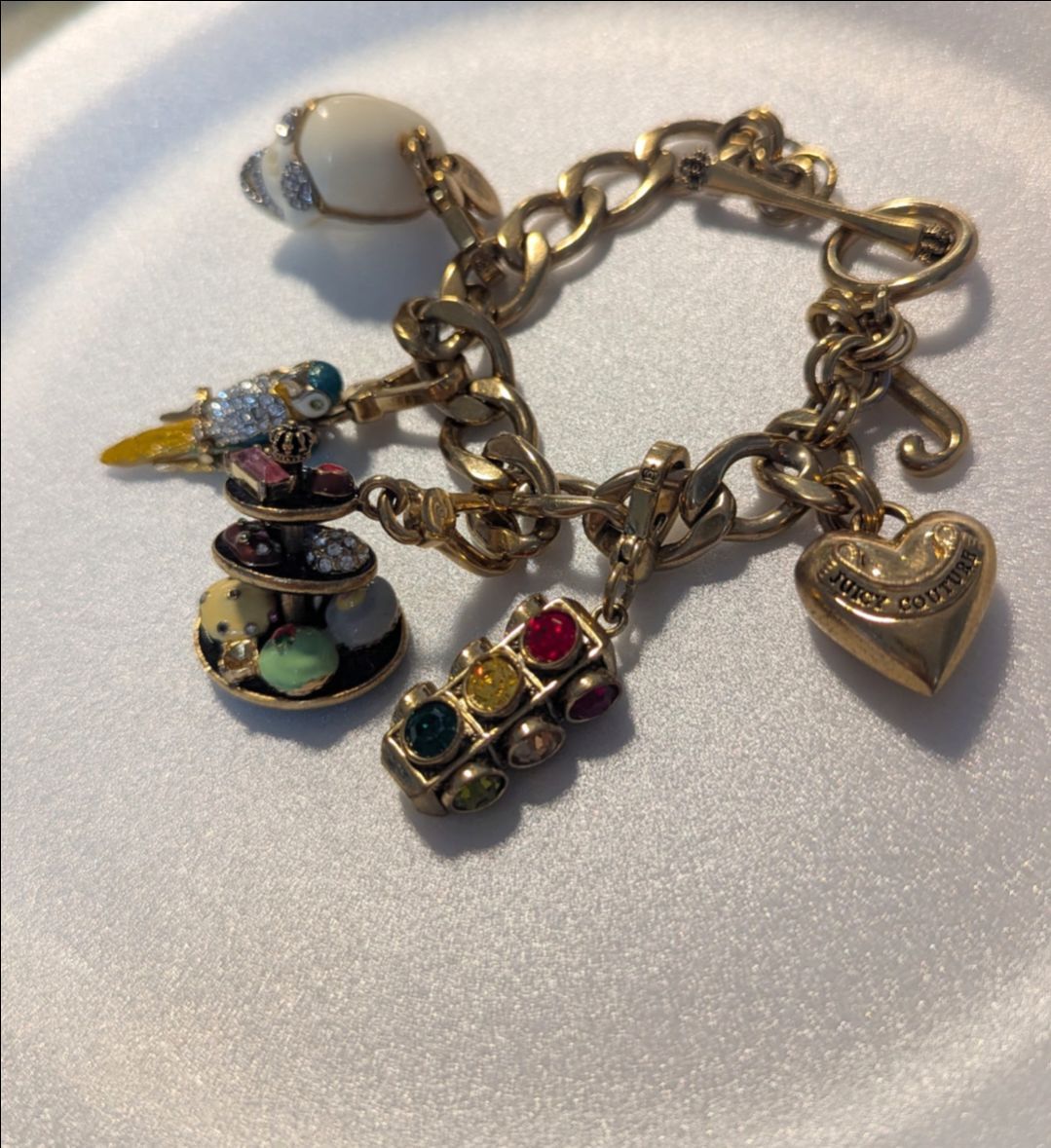Juice couture bracelet with charms