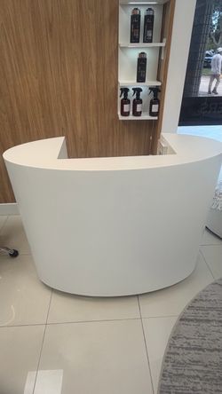 Brand New Modern Curved Reception Desk – $800  Brand new white curved reception/front desk with a clean, modern design and built-in storage.  Perfect 