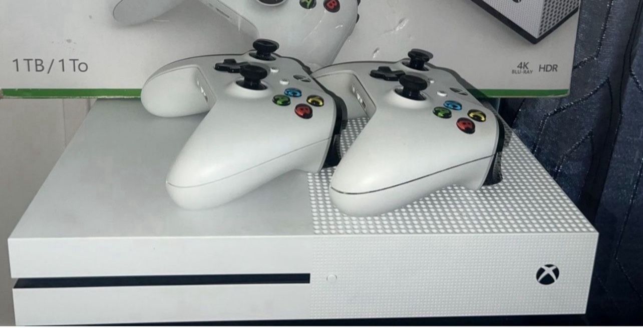 Xbox 1TB memory with 2 wireless controllers like new condition