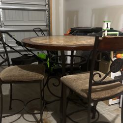 Dinning table with three chairs 