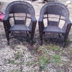 Two Brown Wicker Chairs