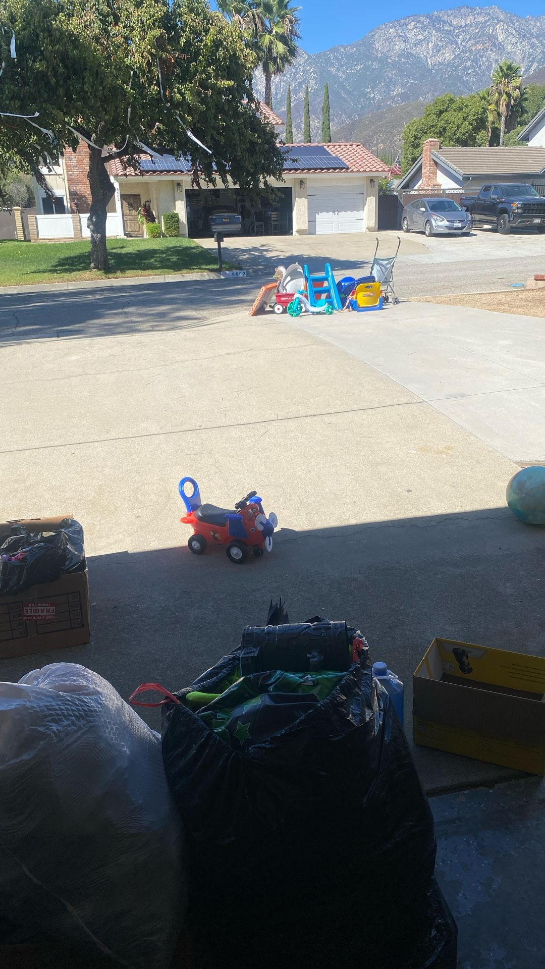 Pile Of Kids Clothes & Toys etc…